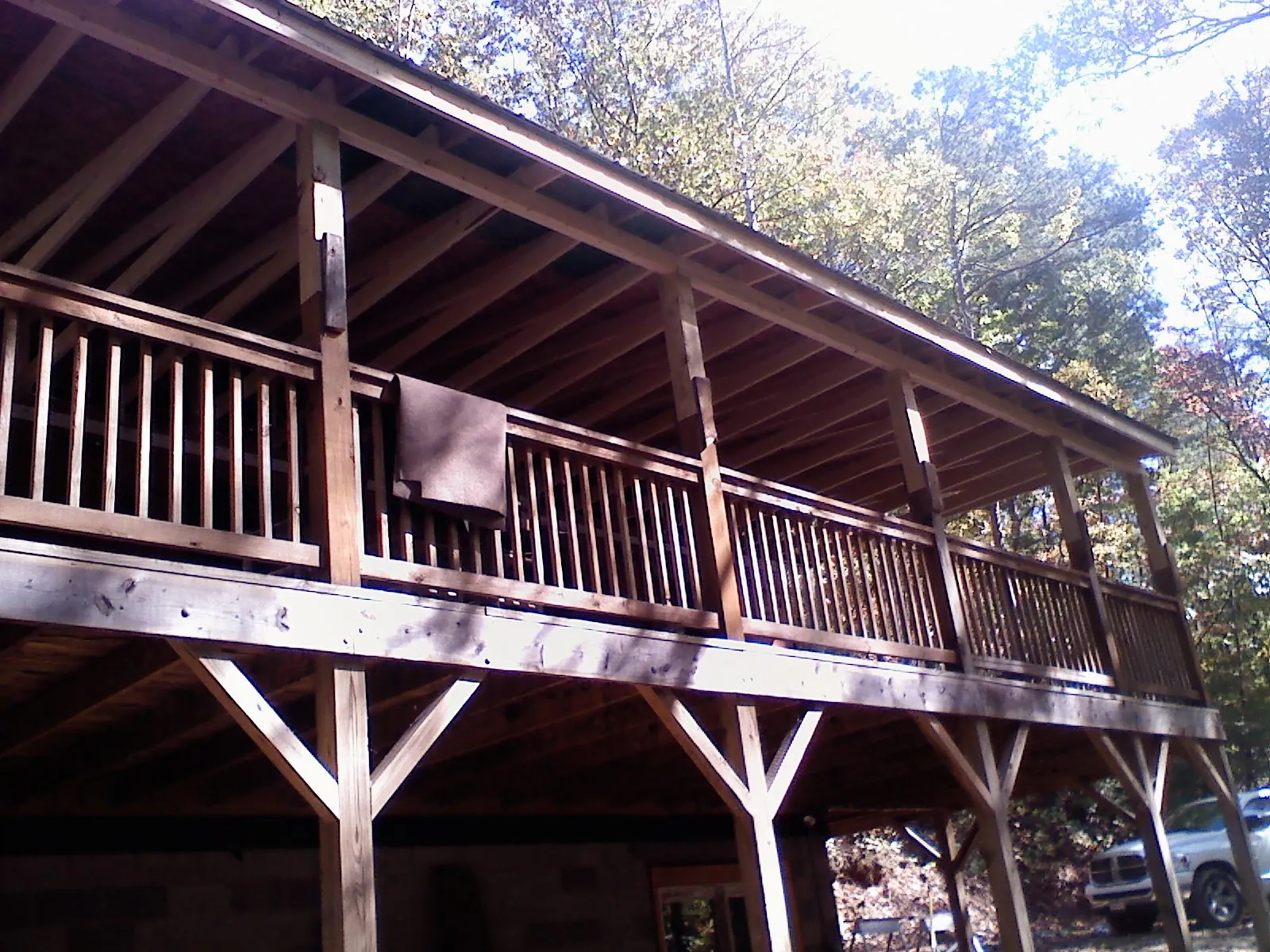Timber framing under a new elevated porch and deck — Roof Leak Repair in Jonesboro by Roofing Brothers